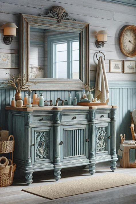 Bring beachy vibes to your bathroom with this weathered blue vanity. Perfect for a coastal-themed retreat. #CoastalDecor #BeachHouseStyle Bayou Cottage, Blue Vanity, Coastal Bathroom, Coastal Bathrooms, Beachy Vibes, Beach House Style, Vanity Ideas, May I, Coastal Decor