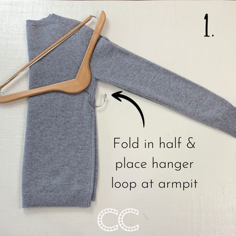 Hang Cardigans On Hangers, Tee Shirt Organizer, Hanging Sweatshirts, How To Fold A Sweater Over A Hanger, How To Hang Sweatshirts, Hanging Cardigans On Hangers, Sweaters In Closet Organizing, Sweater Hanging Hack, Organize Closet By Outfit