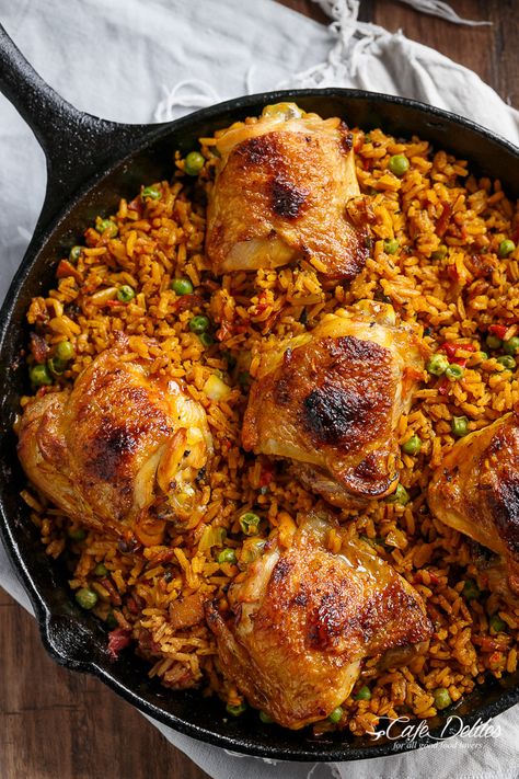 One Pan Crispy Spanish Chicken and Rice (Arroz Con Pollo) | http://cafedelites.com Spanish Chicken And Rice, Pollo Recipe, Spanish Chicken, Cafe Delites, High Protein Meal Prep, Rice Dish, Chicken And Rice, One Pan Meals, Idee Pasto Sano