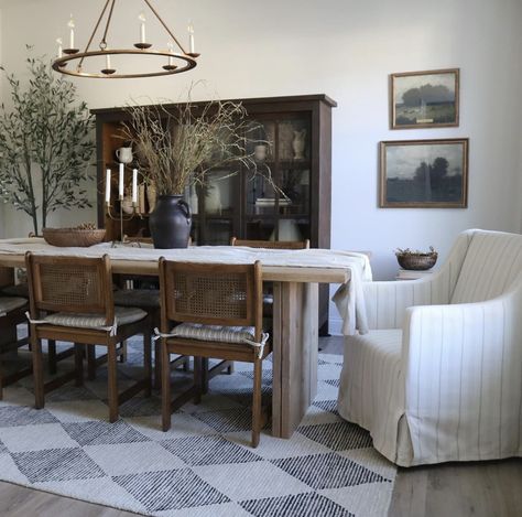 Dining Room With Dark Wood Table, Linen Dining Room Chairs, Dining Room Design Organic Modern, Italian Style Dining Room, Mixing Wood Tones Dining Room, Moody Cottage Dining Room, Dining Room Armoire, Modern Antique Dining Room, Moody Dining Room Decor