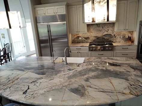 BLUE IJEN Quartzite Kitchen Island With Sink Blue Tempest Quartzite Kitchen, Ijen Blue Quartzite Kitchen Island, Blue Lava Quartzite Countertops, Blue Roma Quartzite Kitchen, Ijen Blue Quartzite Kitchen, Calcutta Quartzite, Blue Quartzite Countertops, Ijen Blue Quartzite, Brown Quartz Countertops