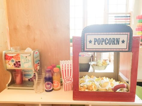 Popcorn Dramatic Play, Movie Theater Dramatic Play, Movie Party Decorations, Grocery Store Dramatic Play, Cardboard Rocket, Theater Popcorn, Popcorn Stand, Dramatic Play Themes, Daycare Themes