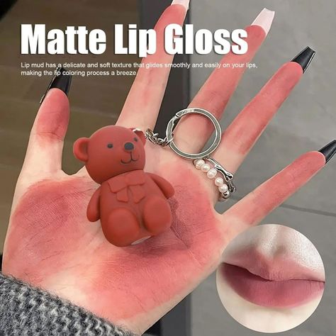 Obsessed with Cuteness? You Need This! 💄🐻✨ Meet the trending Mocallure 2-in-1 Keychain Bear Lipstick, the ultimate fusion of Korean cuteness and high-quality makeup! This adorable bear-shaped lipstick isn’t just a beauty must-have—it’s your new go-to accessory. Clip it onto your bag, water bottle, or keys, and keep your favorite matte velvet lipstick with you wherever you go. Perfect for quick touch-ups, this lightweight, non-drying formula glides on effortlessly for a soft, silky finish tha... Korean Lipstick Products, Bear Lipstick, Korean Lipstick, Lipstick Products, Matte Lip Gloss, Velvet Lipstick, Beauty Must Haves, Matte Lips, Soft Textures