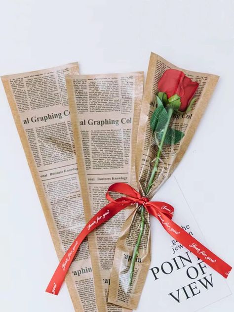 5pcs Flower Wrapping Bag, Plastic Newspaper Print Bouquet Bag For Single Rose Wrapping | SHEIN USA Single Rose Bouquet, Newspaper Wrapping, Single Flower Bouquet, Bouquet Bag, Paper Flower Wreaths, Paper Flower Garlands, Flower Wrapping, Handmade Flowers Fabric, Moms Crafts