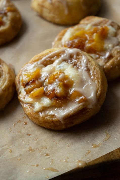 These super simple Pineapple Cinnamon Cheese Danish Minis are made with prepared crescent roll dough, fresh caramelized pineapple and cream cheese- for a delicious dessert that's sure to please! Pineapple And Cream Cheese, Cinnamon Crescents, Crescent Roll Casserole, Orange Sweet Rolls, Crescent Recipes, Cheese Crescent Rolls, Recipes Quick And Easy, Crescent Roll Breakfast Casserole, Breakfast Crescent Rolls