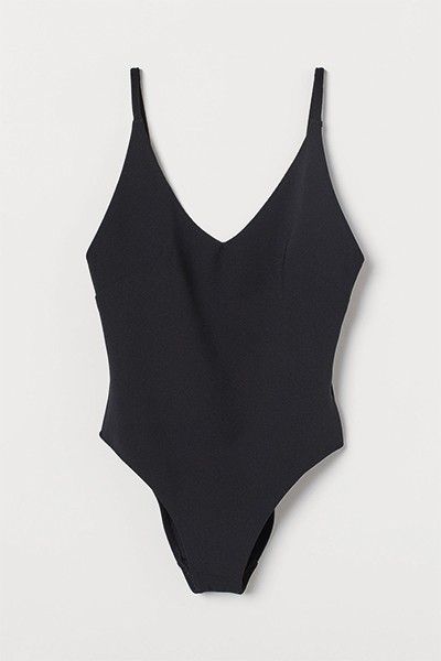 18 Bodysuits We Love | sheerluxe.com Beach Bathing Suits, Casual Skirt Outfits, V Neck Bodysuit, Casual Skirt, Ladies Dress Design, Black Bodysuit, Fashion Company, World Of Fashion, Shoulder Straps