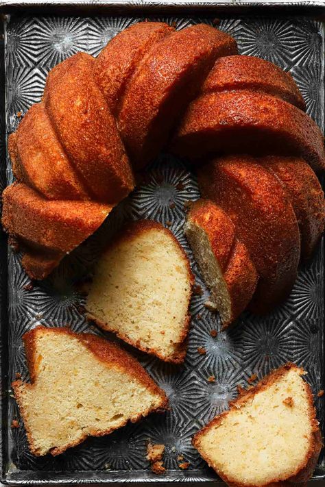 This mango pound cake is tender, moist, flavorful and infused with mango and orange flavors. #cake #magocake #mangorecipe #mangodessertrecipe #poundcake #poundcakerecipe #mangopoundcake #foodphotography #poundcakephotography Mango Loaf Cake, Pound Cake Banana, Mango Pound Cake Recipe, Fresh Mango Cake, Homemade Poundcake Pound Cake Recipes, Mango Dessert Recipes, Orange Cream Cheese, Mango Cake, Pear Cake