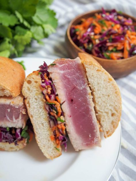 "This seared tuna sandwich is easy to make and with bright, light, Asian-inspired flavors from a punchy wasabi mayo and sesame slaw. Great for a light meal or lunch." | Easy packed lunch idea by Caroline’s Cooking Grilled Tuna Sandwich, Tuna Fish Sandwich Recipe, Sesame Slaw, Best Tuna Sandwich, Tuna Sandwich Recipes, Seared Tuna Steaks, Tuna Fish Sandwich, Wasabi Mayo, Seafood Sandwiches