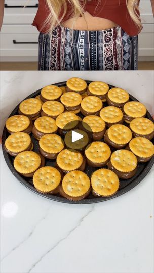 218K views · 2.6K reactions | 2 ingredient treat that is so addicting! | 2 ingredient treat that is so addicting!

I make a quick and easy dessert treat using just ritz crackers and reeses peanut butter. | By Life with Alexa | This is the easiest and
quickest treat you will ever make. Just place some ritz
crackers along any pan that you have. I used a pizza pan and
then you are going to place on some Reese's peanut butter
cups. This really is the perfect treat for any occasion.
It can be a low-calorie dessert after dinner. You can bring it
to a party or you can have it as an afternoon snack for you
and the kids. Once you've placed all of your Reese's, it
is ready for the oven. Set it to 350 degrees and it'll cook
for about five to seven minutes. Just be sure to watch
it because you don't w Pretzels With Reeses Peanut Butter Cups, Chocolate Dipped Ritz Crackers, Ritz Cracker Dessert, Ritz Sandwiches, Cracker Dessert, Candy Tray, Reese's Peanut Butter Cups, Quick Treats, Salty Treats