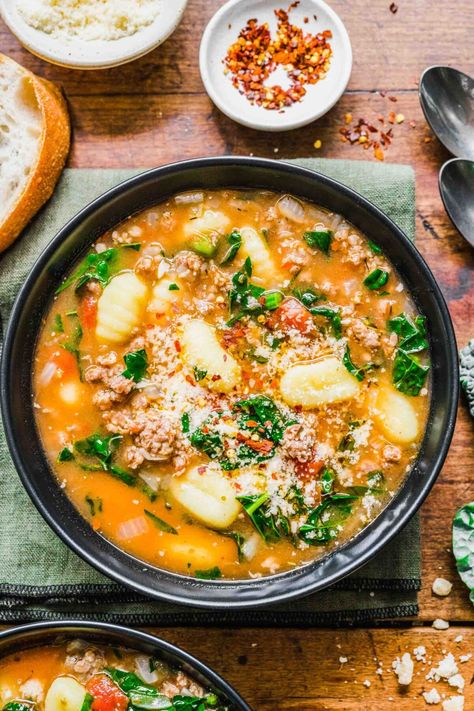 How to Make Hearty Sausage Gnocchi Soup Sausage Gnocchi Soup, Tomato Gnocchi Soup, Longhorn Parmesan Crusted Chicken, Sausage Slow Cooker, Sausage Gnocchi, Gnocchi Recipes Soup, Sausage And Kale, Spicy Italian Sausage, Sausage Soup Recipes