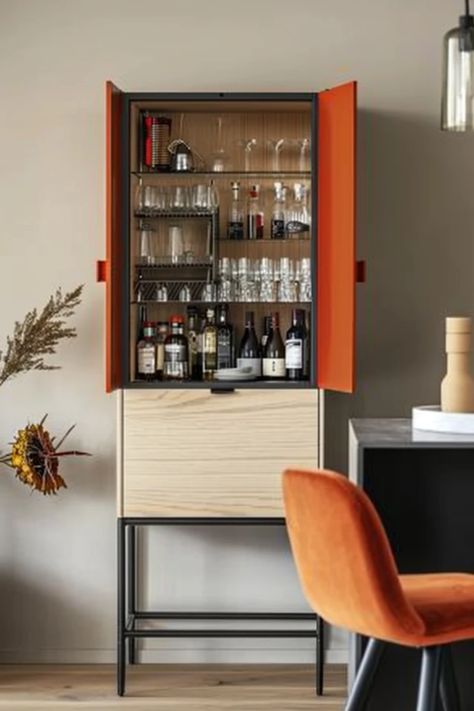 Looking to make your kitchen even more fabulous? Check out these stylish bar cabinet ideas that should definitely be on your radar. From sleek modern designs to classic vintage styles, we have something for every taste. Discover practical storage solutions that keep your favorite drinks and glassware secured while enhancing your kitchen's aesthetic. These chic designs combine function and fashion seamlessly, allowing you to impress your guests and elevate your home entertaining game. Say goodbye to clutter and hello to organized elegance! Mini Bar Ideas For Home Living Rooms, Kitchen Bar Cabinet, Bar Cabinet Ideas, Diy Bar Cabinet, Living Room Bar Cabinet, Bar Cabinet Design, Modern Kitchen Bar, Cabinet Storage Solutions, Home Bar Setup