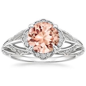 Glistening pavé diamond leaves ascend to form a floral halo that encircles the center morganite in this resplendent diamond ring. The ring's gentle curvature and open detailing allows the beautiful design to sparkle from all angles (0.20 total carat weight). 14k Rose Gold Jewelry, Pink Gold Jewelry, Pink Gold Rings, Rose Gold Morganite, Pave Diamond Ring, Leaf Jewelry, Brilliant Earth, Floral Jewellery, Rose Gold Jewelry