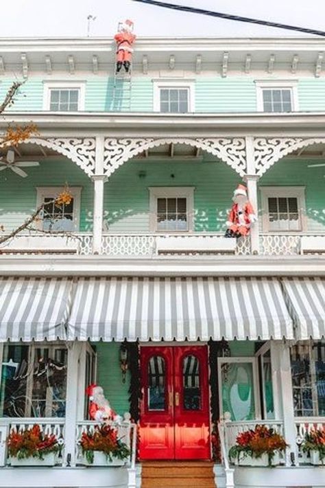 A great way to get into the holiday spirit in New Jersey is to experience Christmas in Cape May. Discover the best Cape May Christmas events and activities for one of the best places to spend Christmas in New Jersey. | cape may Christmas lights | cape may new jersey Christmas | Christmas in cape may NJ | cape may at Christmas Christmas In Cape May Nj, Cape May New Jersey Christmas, Cape May Christmas, Cape May New Jersey, Winter Travel Destinations, Usa Destinations, East Coast Road Trip, Cape May Nj, Christmas Events