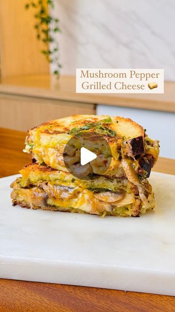 Guntas Sethi on Instagram: "✨Mushroom Pepper Grilled Cheese✨

⚠️warning: may cause uncontrollable sandwich cravings😋

This Mushroom Pepper Grilled Cheese Sandwich is one of the best things you’ll ever have! The creamy mushroom filling is so delicious, you won’t stop at just one bite!🤤

Recipe: 

For the filling:
-1 cube butter 
-1 cup onions, thinly sliced 
-1 cup mushrooms, thinly sliced 
-1 tbsp salt 
-1 tbsp garlic, finely chopped 
-1 tbsp chilli flakes 
-2 tbsp pepper 

For tempering:
-1 tbsp ghee 
-1 tbsp mustard seeds 
-4/5 curry leaves 

For Assembling:

-Take a slice of sourdough bread or any bread of your choice. Spread green chutney on one side, layer it with cheddar cheese and your preferred filling, then add some mozzarella cheese. Close it with another slice of bread, grill Bread Sandwich Recipe Indian, Mushroom Sandwich Recipes, Sandwiches Ideas, Sandwich Recipes Indian, Mushroom Filling, Mushroom Sandwich, Lunch Recipes Indian, Sourdough Bread Sandwiches, Sandwich Bread Recipes