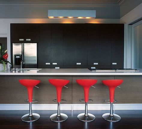 Ultra-#modern #kitchen with stylish bar stools in red by jessop #architects Homemade Kitchen Island, Red Bar Stool, Modern Bar Stools Kitchen, Sustainable Kitchen Design, Modern Kitchen Bar, Colorful Bar Stools, Red Bar Stools, Red Bar, Sustainable Kitchen