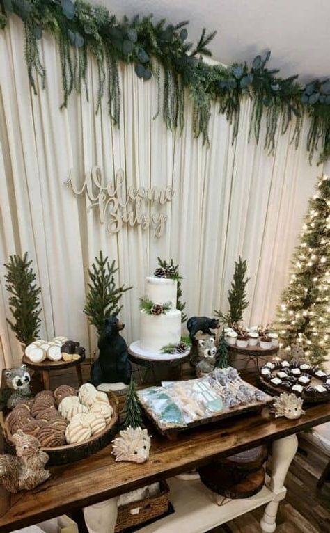 35+ Winter Wonderland Baby Shower Ideas You'll Swoon Over - One Sweet Nursery Winter Woodland Dessert Table, Dark Forest Baby Shower Ideas, Woodland Forest Baby Shower Theme, January Baby Boy Shower Ideas, Boy Baby Shower Woodland Theme, Bridal Shower Forest Theme, Woodland Baby Shower Dessert Table, Cozy Party Theme, Christmas Baby Shower Table Decor