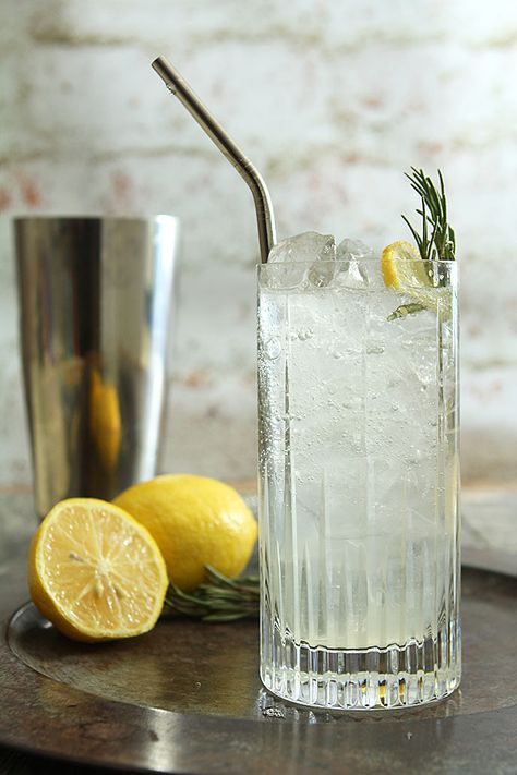 Rosemary Collins - Gin, simple syrup and lemon are transformed with a hint of rosemary. Cocktail With Rosemary Simple Syrup, Rosemary Cocktail, Colorado Food, Collins Cocktail, Rosemary Simple Syrup, Tom Collins, Gin Cocktails, Delicious Cocktails, Holiday Drinks