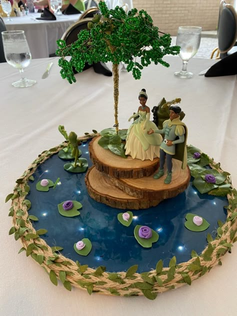 Central Pieces Ideas, Princess Tiana Centerpiece, Tiana Centerpiece Ideas, Sweet 16 Tiana Theme, Tiana Princess And The Frog Quince Theme, Princess Tiana Wedding Theme, Tiana Centerpiece, Tiana Themed Quince, Princess And The Frog Quinceanera Theme