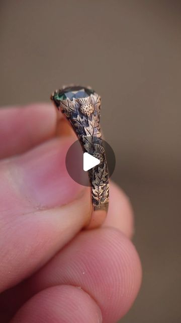 Andrew Ashcroft on Instagram: "Hand engraved thistle ring in gold set with a green sapphire. each ring is unique and made bespoke to order. DM for quotes." Thistle Ring, Green Sapphire, Gold Set, Hand Engraving, Wedding Stuff, Bespoke, Sapphire, Engagement Rings, Ring