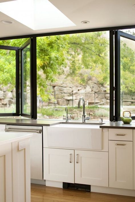 Your New Dream Kitchen Might Straddle the Line Between Indoors & Out Extension Veranda, Kitchen Window Design, Folding Windows, Kitchen Design Styles, Kitchen Windows, Indoor Outdoor Kitchen, Traditional Kitchen Design, Building A New Home, Kitchen Window