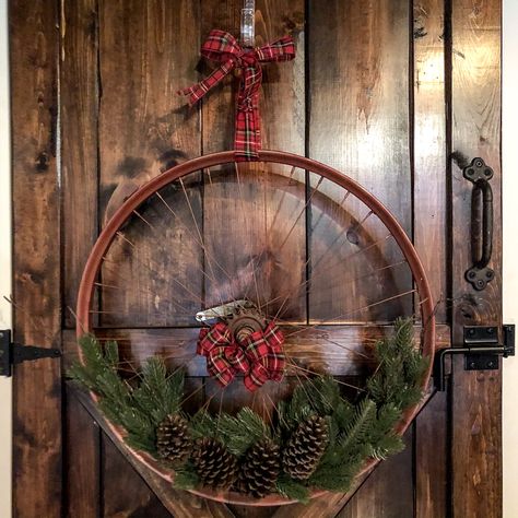 Learn how I make my wheel wreaths, where to order one, and how to get it in time for the holidays!  #wreaths #cycling #bicyclewheel #bicyclewheelwreath #homemadewreath #decor #holidaydecor #christmasdecor #frontdoor #frontdoordecor #upcycle #upcycledbicyclewheel Wagon Wheel Christmas Decor, Bike Wheel Wreath, Bicycle Wheel Wreath, Wheel Wreath, Make A Clock, Red Christmas Wreath, Copper Christmas, Orange Wreath, Bike Wheels