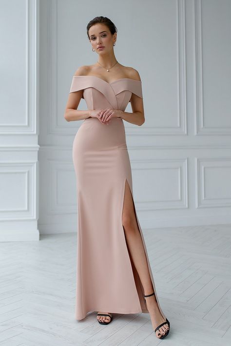 Embrace the epitome of understated glamour in the Beige Off-The-Shoulder Maxi Dress – a captivating choice for the modern sophisticate. Imagine yourself adorned in the subtle allure of beige, the off-the-shoulder neckline adding a touch of romantic whimsy. As you glide across the room in the graceful maxi silhouette, you exude confidence and elegance.  #beigedress #maxidress #dress #dresses #offtheshoulder #eveningdress #weddingdress #promdress Beige Formal Dresses, Dress Classy Elegant, White Cropped Jacket, Cropped Black Jacket, Bm Dresses, Purse Outfit, Backless Midi Dress, Strappy Maxi Dress, Dresses Classy