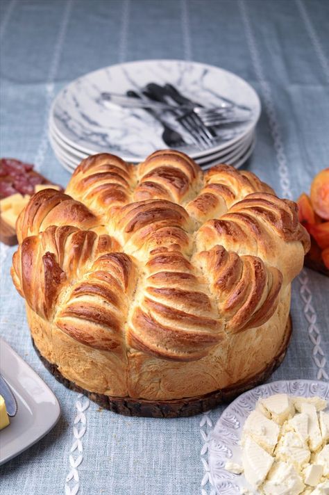 This festive Bulgarian bread is prepared and served for the happiest occasions. You can’t have a wedding, birthday or Christmas without it. Every family has a recipe that is passed down from generation to generation. The crust of the bread is flaky and buttery, and the inside is so fluffy. I prepare this bread every time we have special occasions or gatherings with friends and family. Bread From Around The World, Ukrainian Bread Recipes, Bulgarian Bread Recipe, Festive Bread, Bulgaria Food, Eastern European Recipes, Mediterranean Spices, Gatherings With Friends, Measuring Ingredients