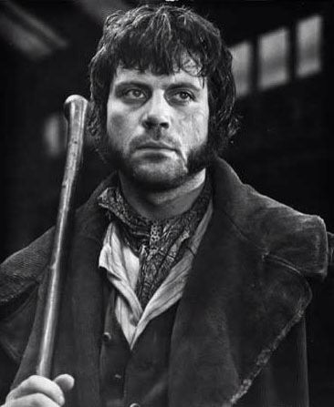 Bill Sikes is an angry person. He adopted Oliver to work for him. Bill Sykes, Lion Of The Desert, Oliver Reed, Oliver Twist, Great Films, Charles Dickens, British Actors, Silver Screen, Famous Faces