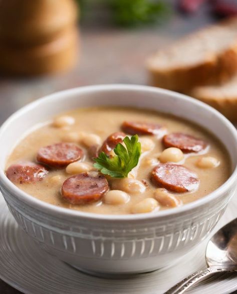 My hubby has been asking for this soup almost every week now! It tastes like a warm hug, he says Bean Sausage Soup, Bean Sausage, Bean And Sausage Soup, Kielbasa Soup, Cooktop Cove, Borscht Recipe, Moms Recipes, Bean Dishes, Hearty Soup Recipes