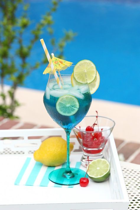 Tropical Blue Summer Sangria Recipe! Blue Sangria, Tropical Sangria, Summer Sangria Recipes, Easy Sangria Recipes, Yummy Summer Drinks, Perfect Summer Drink, Summer Drink Recipes, Sangria Recipes, Tropical Drink