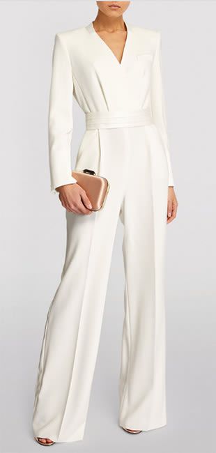 14 best bridal jumpsuits for your 2023 wedding: From ASOS to Net-a-Porter | HELLO! White Jumpsuit Modest, Beige Jumpsuit Outfit Wedding, White Bridal Pantsuit, Jumpsuit Women Elegant, Women’s Wedding Suit, Silk Jumpsuit Wedding, White Wedding Pantsuit, Bridal Pantsuit Brides, Bridal Jumpsuit The Bride