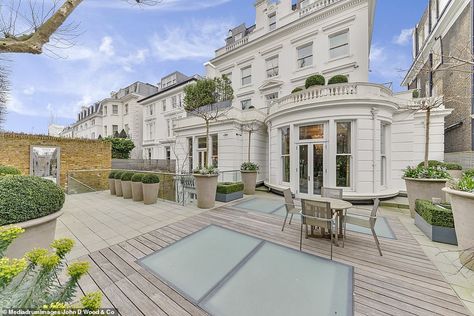 The property's rear exterior with ample space for entertaining. It currently features deck... Kensington Mansion, 10 Bedroom House, London Homes, Kensington Palace Gardens, London Mansion, Luxurious Homes, Palace Garden, Holland Park, London Property