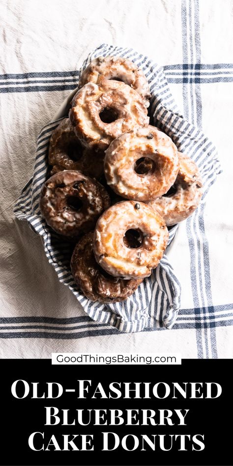 These blueberry cake donuts will rival any that you find at your favorite donut shop. They're deep fried with a crackly layer of glaze and a tender, lightly sweet center. Brunch Birthday Cake, Baked Cake Donut Recipe, Blueberry Donut Recipe, Baked Donut Recipe, Baked Donuts With Donut Pan, Blueberry Cake Donut Recipe, Cake Donut Recipe, Blueberry Donut Holes Recipe, Lemon Blueberry Donut Recipe