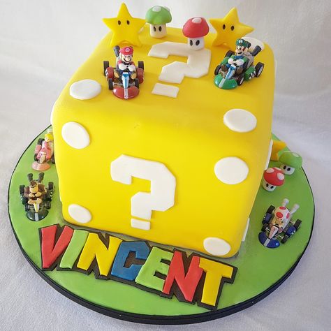 Super Mario question mark block birthday cake Super Mario Question Block Cake, Mario Question Block Cake, Cake Super Mario, Mario Question Mark, Super Mario Birthday Cake, Cake Mario, Mario Bros Birthday Party Ideas, Mario Birthday Cake, Mario Bros Cake