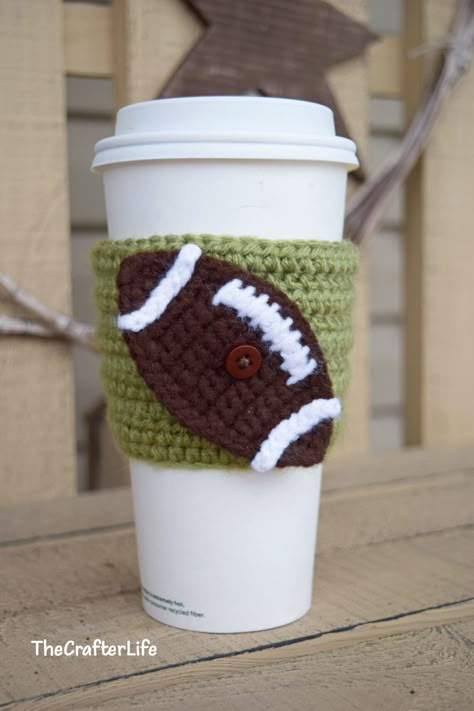 Football Applique Crochet, Crochet Baseball Applique, Crochet Football Cup Cozy, Crochet Mini Football Free Pattern, Crochet Halloween Cup Cozies, School Spirit Crochet Ideas, Crochet Football Applique Pattern Free, Football Crochet Ideas, Football Crochet Pattern Free