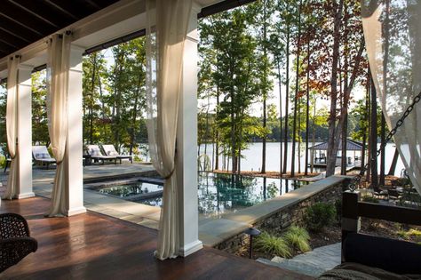 lakeside-weekend-retreat-heather-garrett-design-21-1-kindesign Cottage Deck, Door Bench, Outdoor Drapery, Home Designs Exterior, Lake Houses Exterior, Lake Houses, Apartment Goals, Lakefront Property, Lakefront Homes