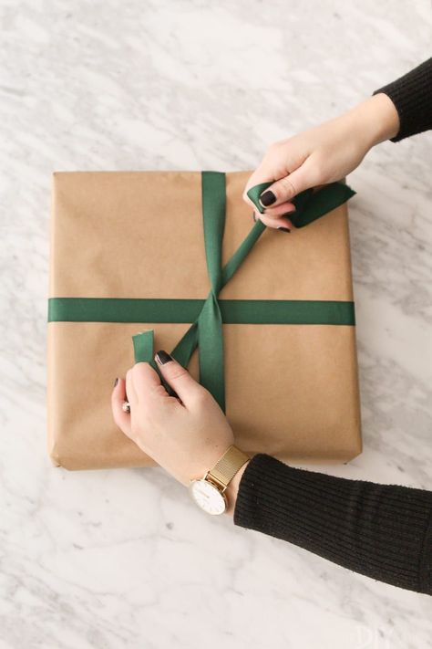 How To Put Ribbon On A Gift, Professional Gift Wrapping Techniques, Ribbon On Presents How To Tie, Wrapping Gifts With Ribbon, Wrapping Presents With Ribbon, How To Tie Velvet Ribbon Bow On Present, Wrapping A Present, Gift Wrapping Ribbon Ideas Bow Tutorial, Ribbon On Christmas Presents