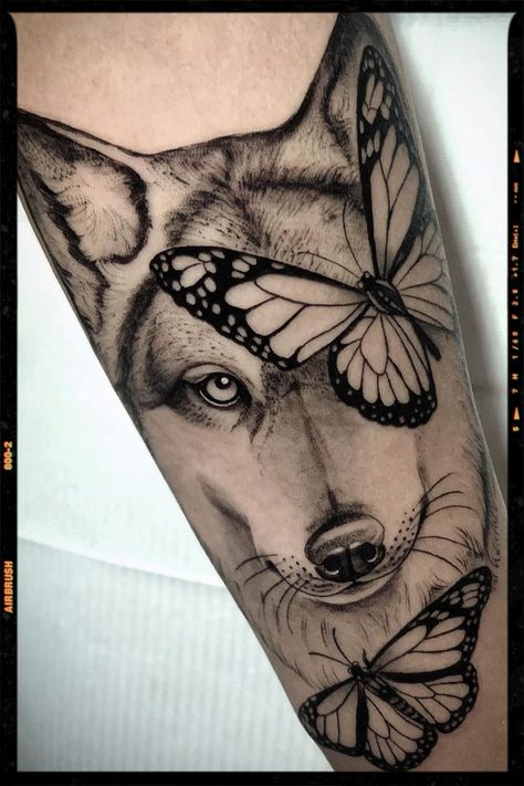 Wolf Tattoo Inspiration Wolf Memorial Tattoo For Women, Wolf Butterfly Tattoo, Wolf And Butterfly Tattoo, Wolf Eyes Tattoo, Wolf Eye Tattoo, Wolf Tattoos For Women, Animal Tattoo Ideas, App Filter, Blue Rose Tattoos