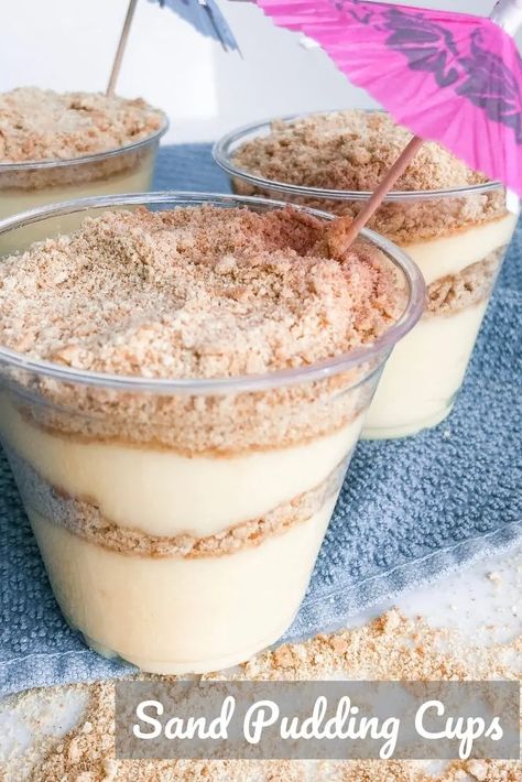 Filled with crushed graham crackers and vanilla pudding, Sand Pudding Cups are sure to be a hit at a beach themed party or any fun surf side celebration! #beachparty #kidsparty #vanillaparfait #easydessert Parfait Desserts Easy, Sand Pudding Cups, Sand Pudding Dessert, Sand Dessert, Sand Pudding, Pudding Cup Recipes, Coconut Bread Recipe, Beach Dessert, Cup Recipes