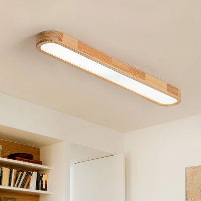 This wooden oval dimmable led flush mount seamlessly blends nordic and modern design elements, making it an ideal addition to various spaces such as bedrooms, living rooms, corridors, cafes, and offices. Crafted from solid wood and acrylic, the oval wood ceiling light boasts a lamp body made of rubber wood with distinct texture. Built-in LED light source eliminates the hassle of frequent bulb replacements. With evenly distributed LEDs, it offers over 80% high light output, while the remote contr Small Galley Kitchen Lighting, Long Flush Mount Kitchen Light, Walk In Closet Ceiling Light, Long Ceiling Light, Walk In Closet Light Fixture, Millennial Gray, Kitchen Flush Mount Lighting Ideas, Strip Lighting Ceiling, Playroom Lighting