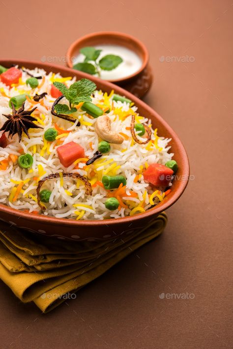 Veg Biryani by stockimagefactory. Indian Vegetable Pulav or Biryani made using Basmati Rice #Sponsored #stockimagefactory, #Indian, #Veg, #Biryani Pulav Rice Photography, Veg Biryani Photography, Lunch Recipes Indian, Indian Food Photography, Rice Photography, Zany Malik, Biryani Rice, Veg Biryani, Indian Rice