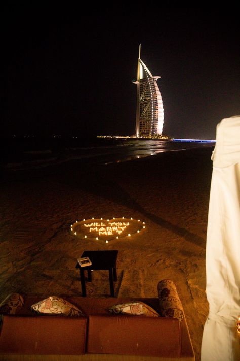 Romantic Proposal at night in Dubai. Find out how to propose in Dubai here Beach Night Proposal, Dubai Proposal Ideas, Proposal Manifestation, Proposal At Night, Dubai Proposal, Girlfriend Proposal Ideas, Dubai Engagement, Proposal Aesthetic, Dubai Couple