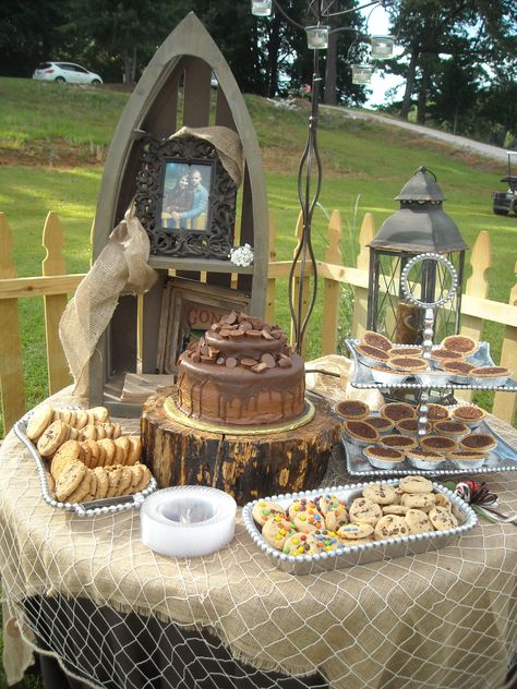 Grooms Table ??? Love the boat, lantern & stump. Grooms Table Decorations, Fish Grooms Cake Ideas, Grooms Table Fishing Theme, Grooms Table Ideas Fishing, Grooms Dessert Table, Grooms Cake Fishing Theme, Fishing Grooms Table, Grooms Table Ideas Receptions, Wedding Fishing Theme