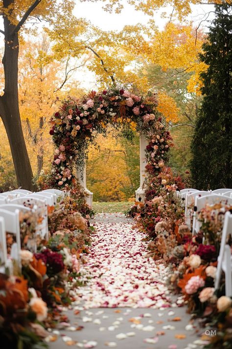 Outdoor fall wedding ceremony with a stunning floral arch in autumn colors, white chairs, and petal-strewn aisle. Perfect for October weddings. Burnt Orange Fall Wedding Decor, Small Outdoor Fall Wedding Ideas, Autumn Outdoor Wedding Ceremony, Fall Wedding Aisles, Wedding Alters Rustic, Fall Wedding Fairytale, Fall Wedding Alter Ideas, November Wedding Outdoor, Fall Wedding Location Ideas