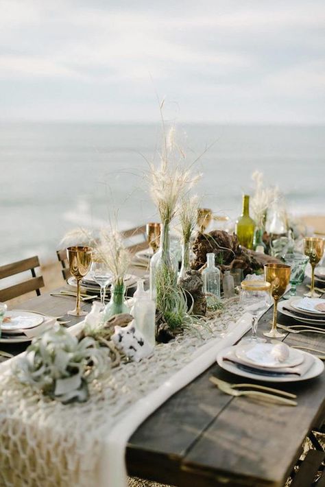 bohemian wedding decorations macrame tablerunner with glass bottles succulents and pampas grass john schnack Corporative Events, Beach Table Decorations, Beach Wedding Tables, Bohemian Wedding Decorations, Beach Table, Boho Beach Wedding, Beach Wedding Inspiration, Beach Wedding Decorations, Beach Wedding Favors