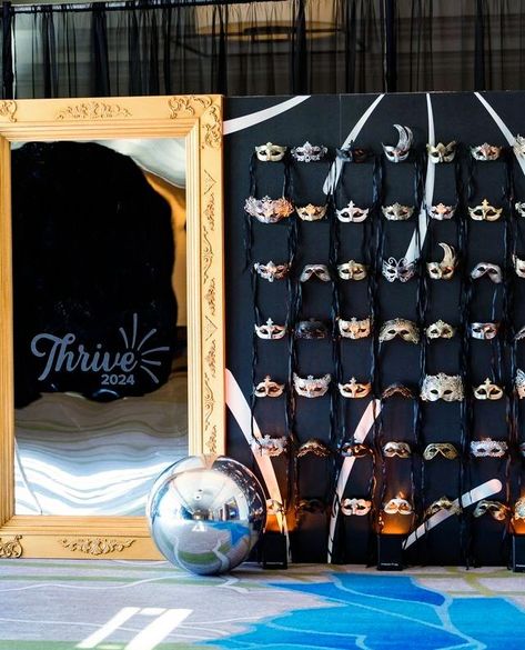 Elegance and mystery in every detail ✨💫 Behold our custom gold and silver mask wall and vintage framed mirror at the Thrive 2024 event.

#maskwall #masquerade #vintagemirror #mirror #framedmirror #goldmirror #blackandgold #silverandgold #elegantdecor #masqueradedecor #masqueradeball #thrive2024 #golddecor #blackdecor #eventdecor #florida #masks #mask #customdecor #customwall Masquerade Charity Ball, New Year’s Eve Masquerade, Masquerade Corporate Event, Masquerade Ball Fundraiser, Masquerade Ball Themed Party, Mirror Themed Party, Masquerade High School Dance, Great Gatsby Activities, Masquerade Diy Decorations