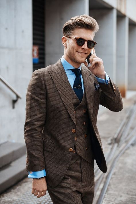 Formal looks are no more boring. Here are 5 suits that will make sure you look on point and leave a long lasting impression at work! A Man In A Suit, Man In A Suit, Brown Suit, Suit Men, A Man, Dark Brown, Walking, Sunglasses