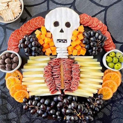 Skeleton Charcuterie Board, Skeleton Charcuterie, Halloween Cheese, Halloween Charcuterie Board, Yogurt Covered Pretzels, Halloween Charcuterie, Perfect Halloween Party, Halloween Party Treats, Party Spread