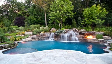 Custom volcanic fire pit inground swimming pool waterfall idea Swimming Pool Waterfall, Kleiner Pool Design, Taman Air, Swimming Pool Landscaping, Luxury Swimming Pools, Custom Swimming Pool, Pool Renovation, Pool Landscape Design, Small Pool Design