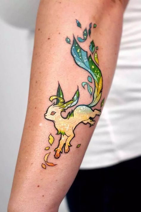 Celebrate your connection to anime culture with these tattoo ideas that embody the spirit of camaraderie, determination, and boundless imagination. Wear your fandom proudly! 🎥🖋 #AnimeConnection #FandomInk #Glaminati Leafeon Pokemon, Fairy Tail Tattoo, Funky Tattoos, Stylish Tattoo, Cartoon Character Tattoos, Pokemon Tattoo, Kawaii Tattoo, Cute Little Tattoos, Gaming Tattoo